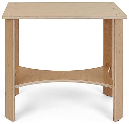 Wooden knockdown display table with four plastic feet 