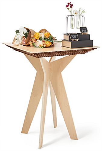 Durable boutique display table with 50 pound maximum weight capacity 
