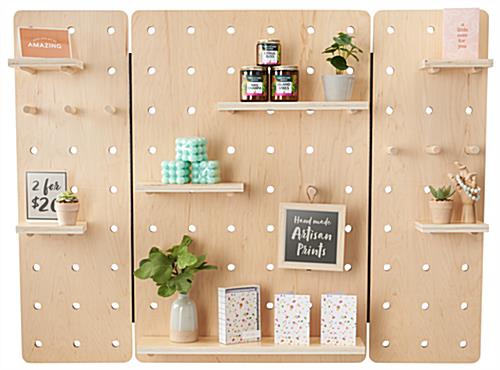 Wall mount swinging pegboard with natural wood color