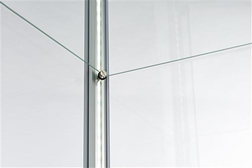 glass display tower with four adjustable tiers