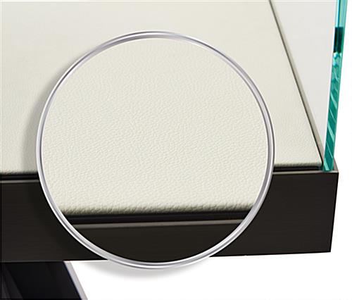 This glass display box with tripod base has a white polyurethane leather interior