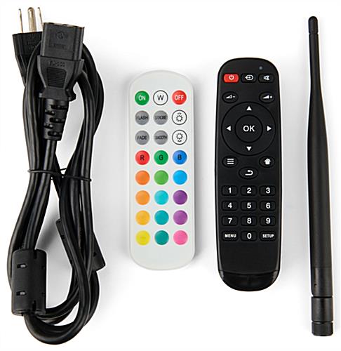 Includes power cord, remote for LED lights, remote for kiosk, and WiFi/Bluetooth antenna