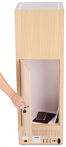 Rear door on oak pedestal display opens to reveal a lockable compartment inside