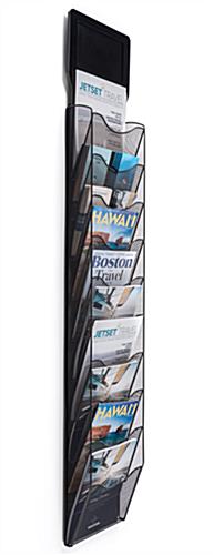 Magazine wall rack with digital sign with literature content