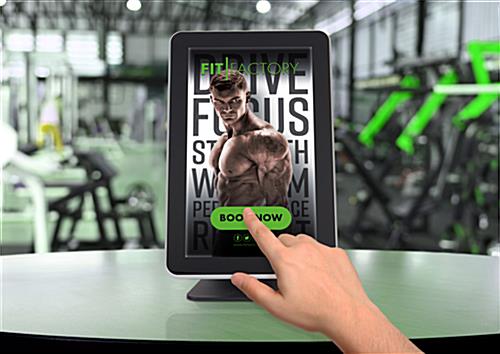 Black 15.6" digital LCD touch screen kiosk in a gym