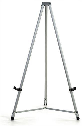 Portable silver tripod easel adjusted at shortest countertop height