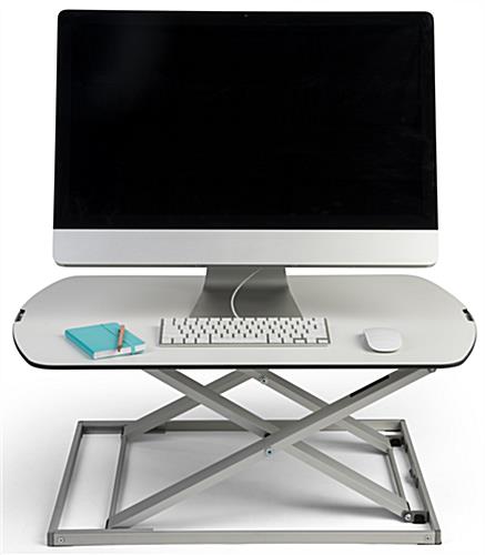 Height adjustable standing desk converter for a more comfortable workday