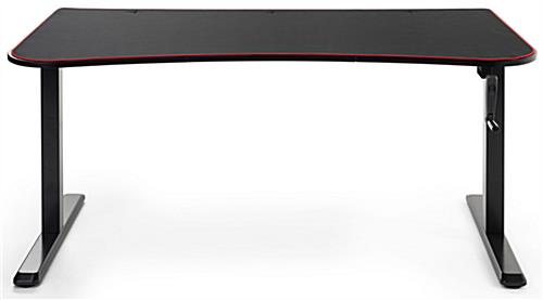 Adjustable computer desktop features ultra-wide mouse pad tabletop with red border
