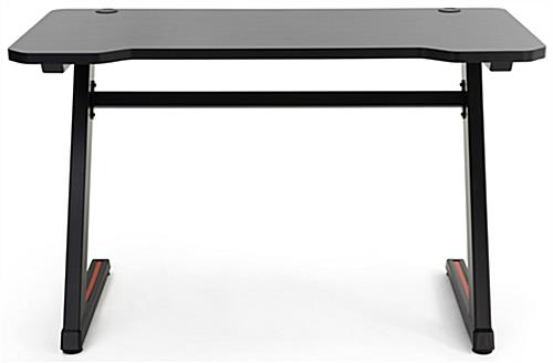 Gaming desk computer table features two matte black z-shaped legs 