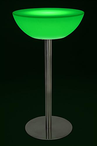 Half-moon LED cocktail table with green illumination