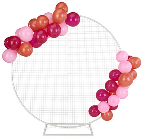 Circle grid backdrop with max weight capacity of 44 pounds