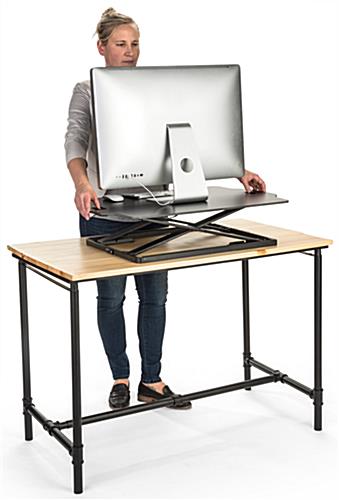 Fold-in standing workstation riser with handles for easy adjustment