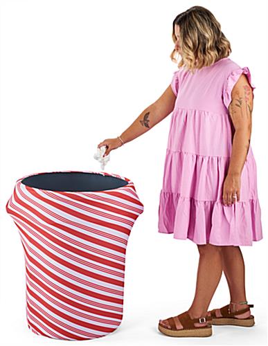 Candy cane stretch trash can cover is excellent during the holidays 