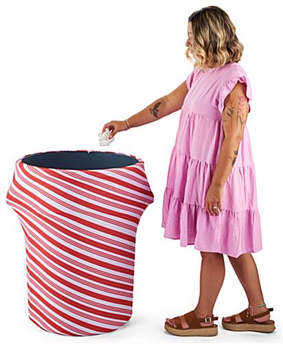 Candy cane stretch trash can cover is ideal at trade shows 