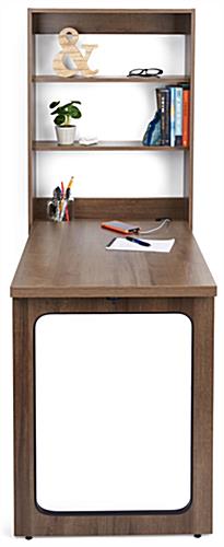 Fold out wall desk with surface area of 22.25 inches wide by 30.2 inches deep