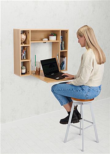Flip down desk with space saving design