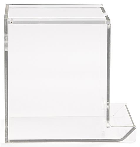 Single use packet dispenser with slim profile 