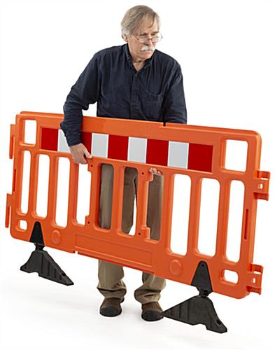 Portable pedestrian barrier system with swivel feet
