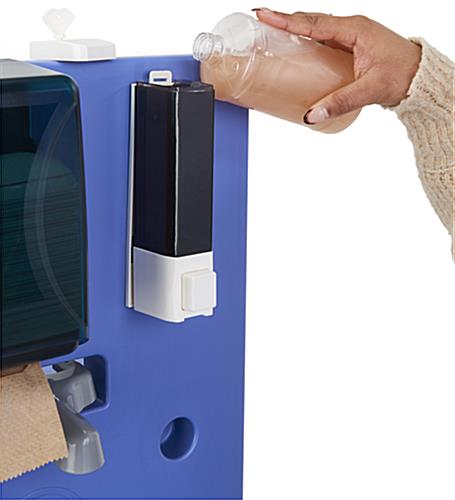 Portable hand washing station with an easy to fill soap dispenser