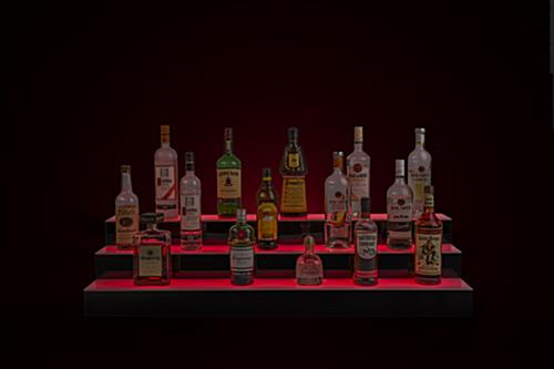 glowing tiered LED liquor shelves