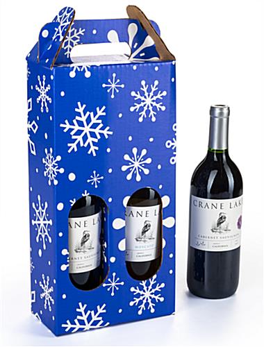 Blue pre-printed cardboard wine carrier with white snowflakes