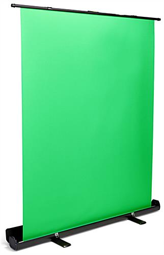 Retractable green screen banner stand features a pop-up design