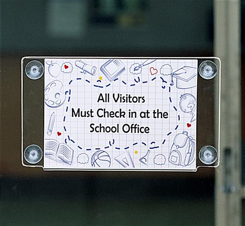Window sign holder can stick to non-porous surfaces