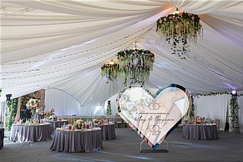 Heart shaped graphic backdrop is great at weddings 