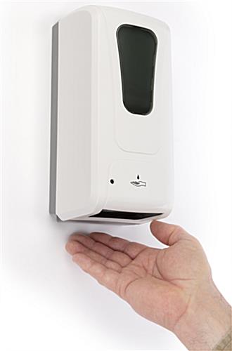 Touch free hand sanitizer dispenser has touchless gel release
