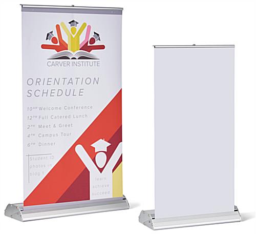 11.75" tabletop banner with custom graphics beside the 8.25" tabletop banner with blank banner