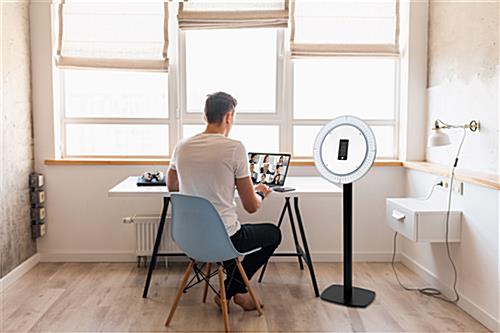 55 inch -70 inch photo booth station with ring light can adjust to the perfect viewing angle 