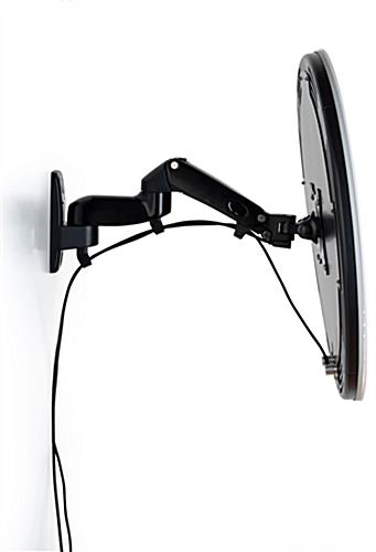 Articulating wall mount photo booth station with multiple adjustment points