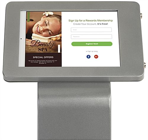 Silver iPad enclosure floor stand with rounded edge design 