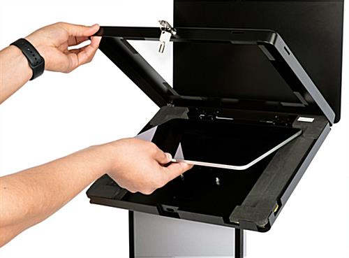 Black and silver customizable tablet info kiosk with hinged internal tray for device access