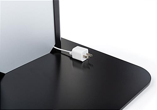 Black and silver brandable tablet kiosk with integrated cable management on back panel 