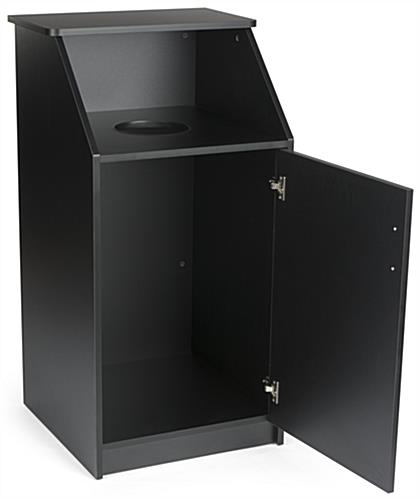 Waste receptacle enclosure with front hinged door 