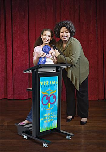 Mobile lectern with custom backlit graphic great for elementary schools and student speakers