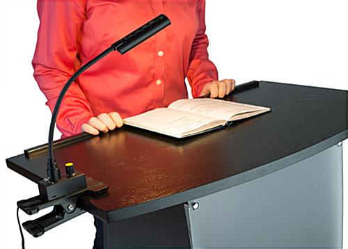 Podium light shown in use on black lectern
