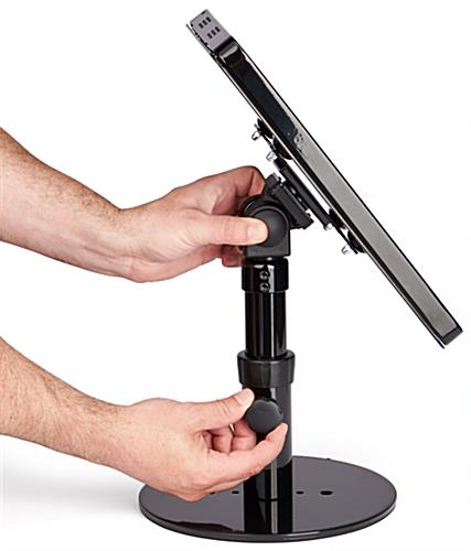 Black adjustable countertop iPad stand can be tilted
