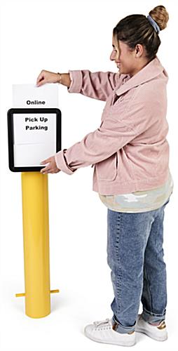 Bollard sign topper allows quick and easy sign changes