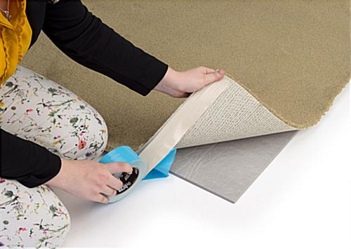 Gray 10’ x 10’ rollable floor padding 