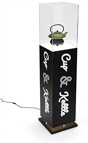 Custom lighted display pedestal for sculpture with contour cut graphics