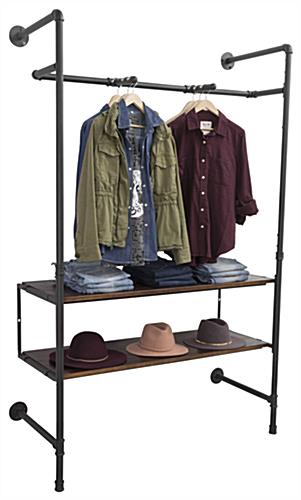 Pipe Outrigger Wall Unit Showcasing Clothes and Hats