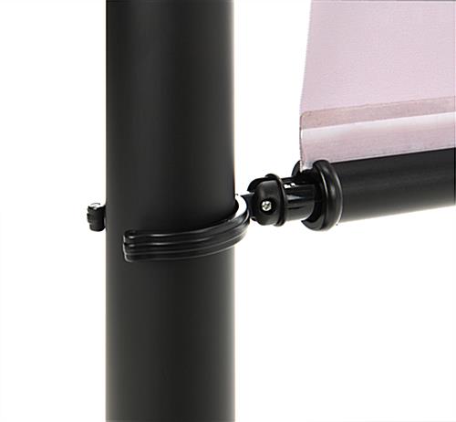 Double-sided retractable stanchion barrier stays securely in place