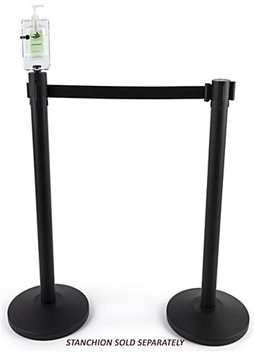 Locking hand sanitizer stanchion topper with rotating axle