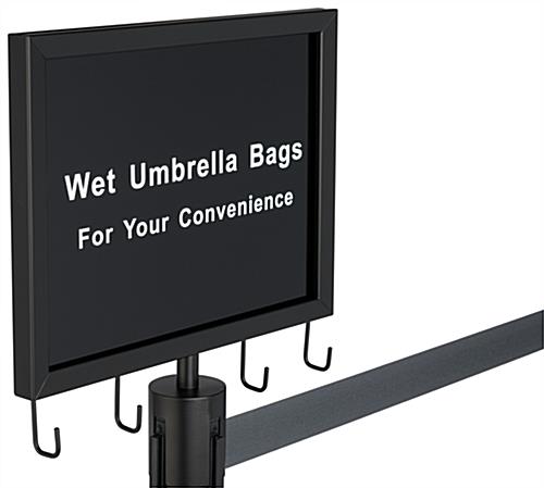 Gray belt stanchion umbrella station with welded hooks for courtesy bags