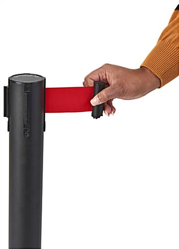 Red retractable belt barrier made for indoor use