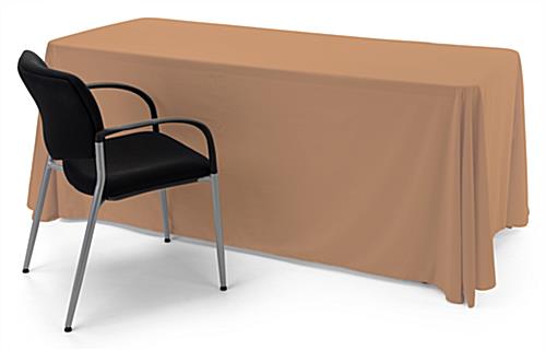 This tan single sided custom table throw features hidden storage
