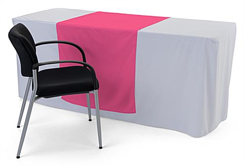 Pink printed table runner is made of polyester fabric
