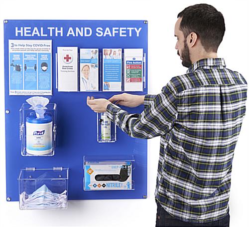 Mounted acrylic health and safety wall board with easy access to PPE supplies